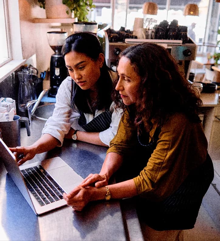 Small-business owners working together.